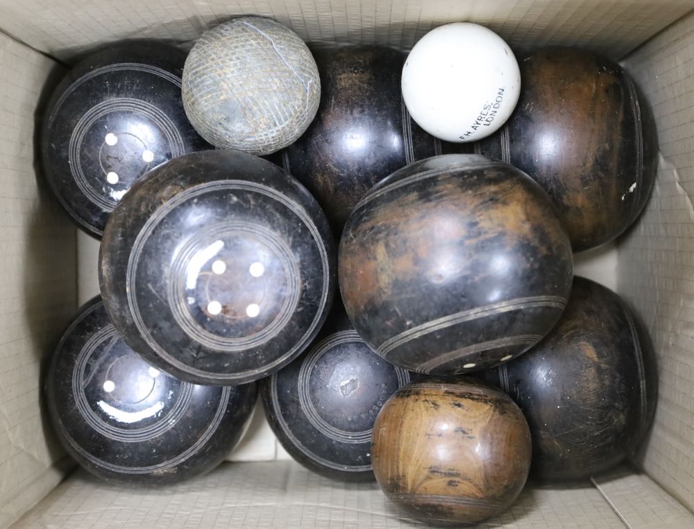 A set and a half of Lignum Vitae bowling woods